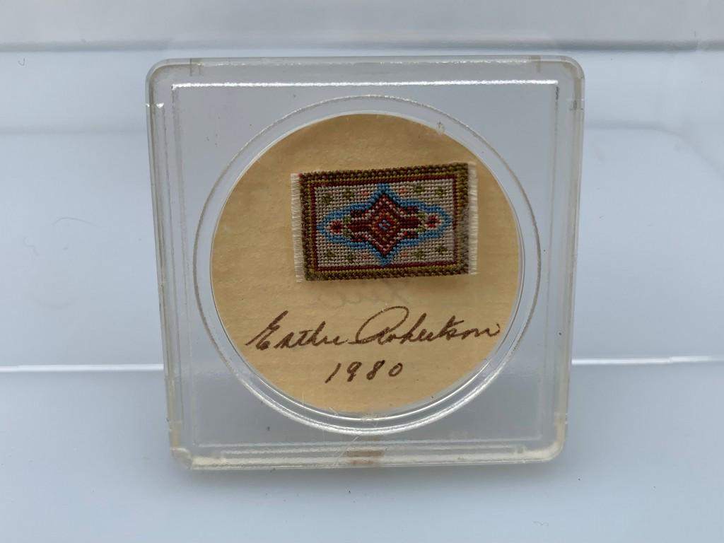 1/4" Scale Needlepoint Rug By Esther Robertson: Esther Robinson is the mother of IGMA artisan William "Bill" Robertson. She made this micro pettipoint scale rug. Very tiny and nicely crafted. Dollhouse Miniature 1/4" scale.