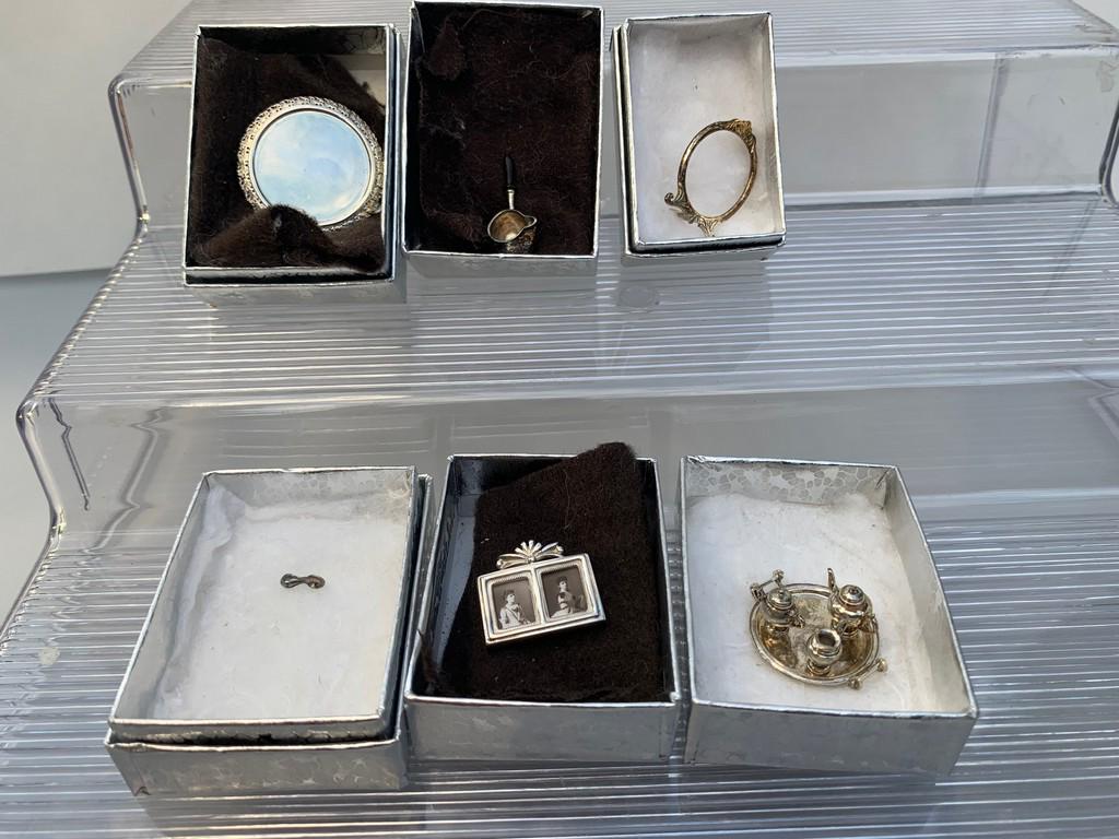 Pete Acquisto - 6 Pc Silver Lot: Six pieces of silver hand crafted by IGMA artisan Pete Acquisto. The lot includes saucepan, two picture frames, baby spoon, cake stand and half scale tea set on platter with handles.