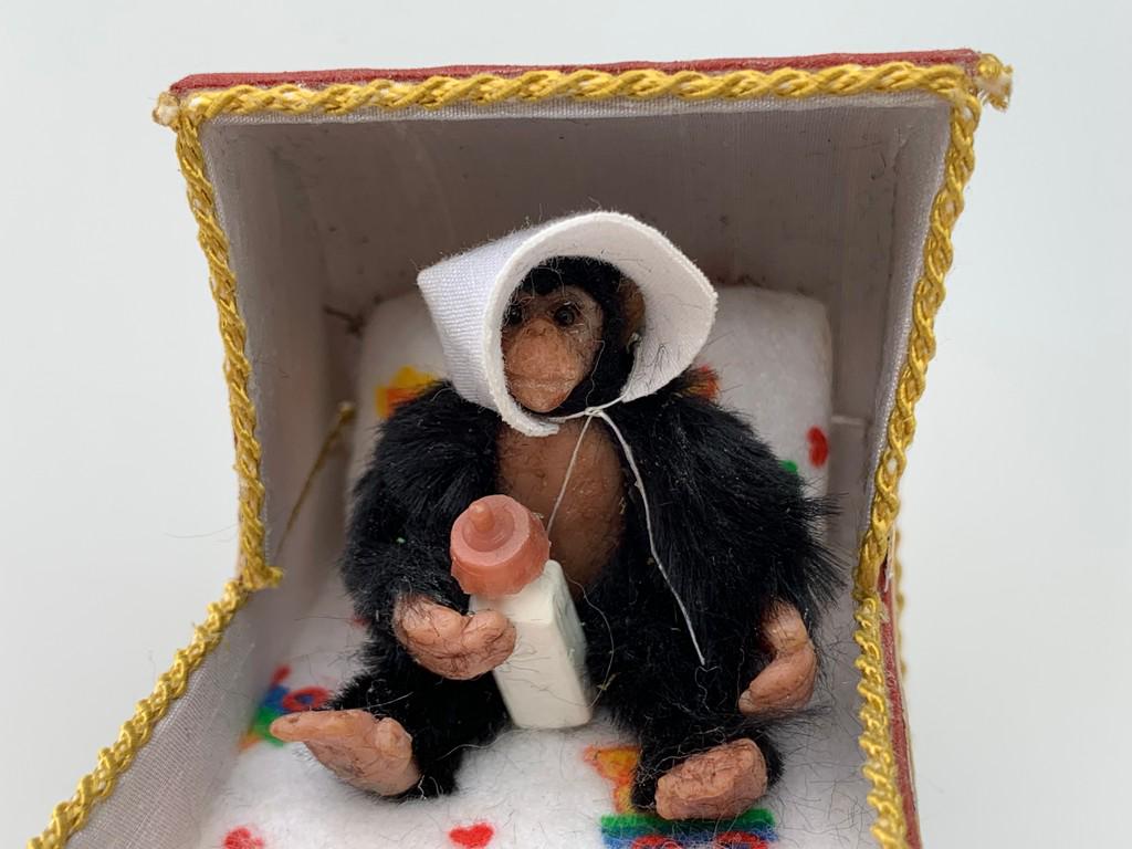 Alice Zinn Baby Stroller w/ Baby Monkey: Alice Zinn made the baby stroller with the baby monkey. The monkey is wearing a scarf and outfit. Signed. Dollhouse miniature 1:12 scale