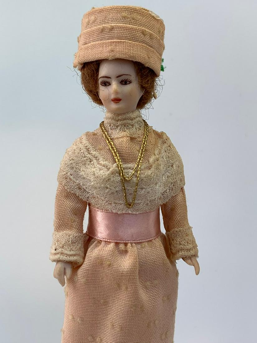 Vintage Antique Lady Doll in Dress & Matching Hat: This doll is an antique/vintage doll with a silk dress and matching hat. She has auburn hair and comes with a doll stand. She's from a private collection where the owners purchased vintage and older d