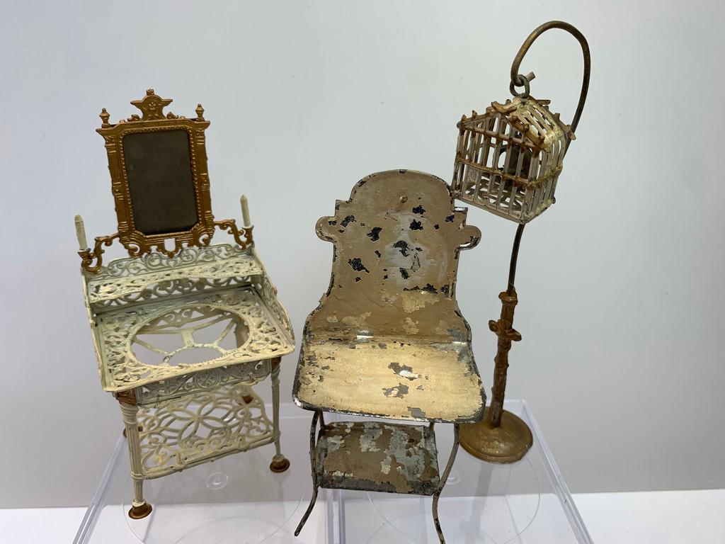 Vintage Soft White Metal & Ormolu 4 Piece Lot: The washstand has built in candles on either side, soft metal painted white and aged as it is vintage. The birdcage has a stand, is white, as well as the washstand in the middle. Mirror is Ormolu with