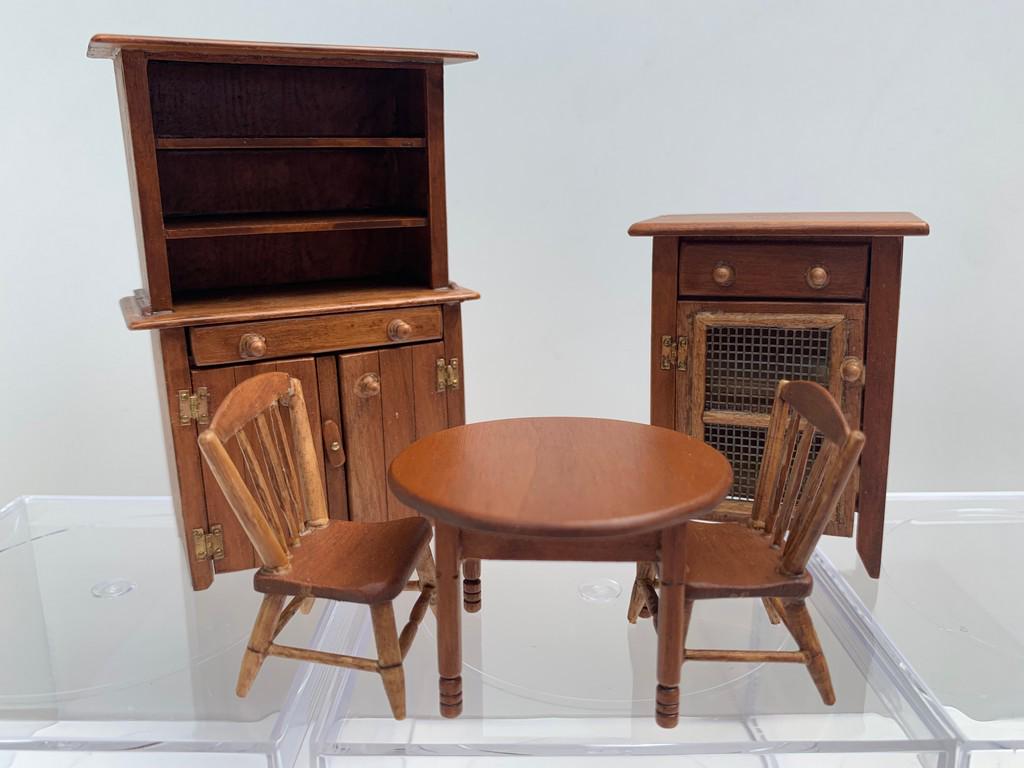 5 Piece Wooden Kitchen Set Signed D2E: A cross between 1/2 and 3/4" scale. Could also be used for a child's play kitchen if using in 1:12 scale. The kitchen furniture is handmade by D2E. Hutch, table, 2 chairs and a wire front jelly/pantry