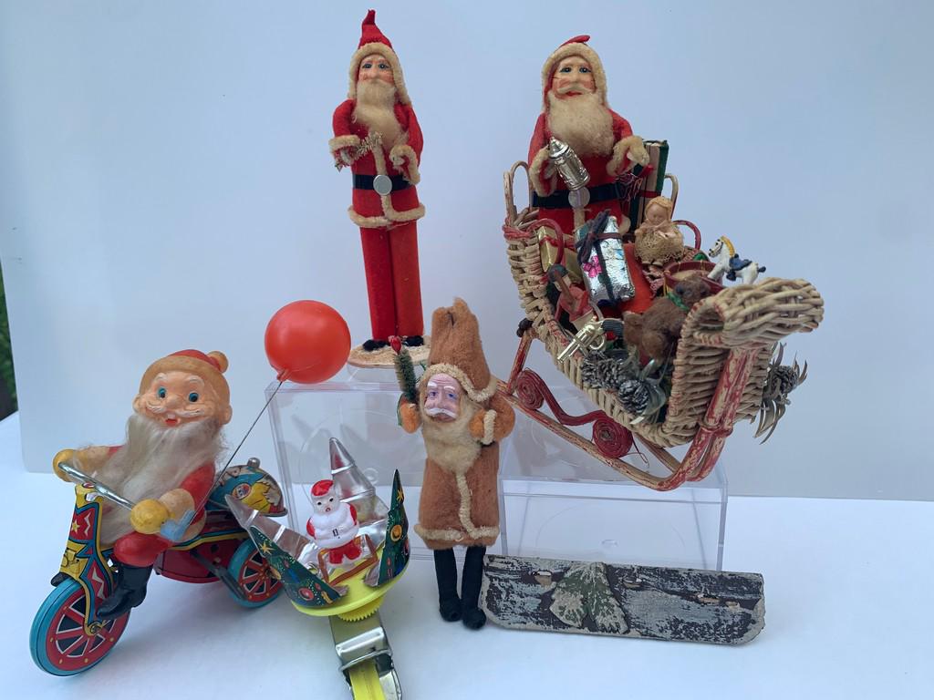 Vintage Lot with 5 Santa Claus Christmas Dolls: 5 Piece lot of assorted vintage Christmas Santa Claus dolls. One Santa is in a sleigh with toys. The Santa on the bicycle is metal.