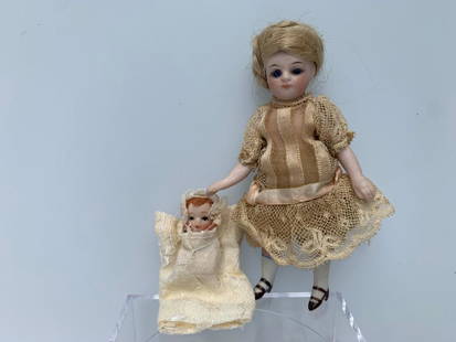 Vtg. Turn of The Century Porcelain Doll, French: Handmade porcelain little French girl doll dressed in Turn of the Century outfit. May be just as old, not sure but came from an estate of vintage and antique dolls. The little doll that is with her is