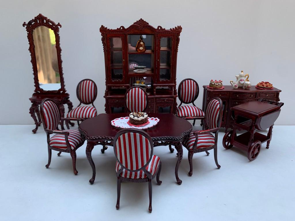 10 Pc. Bespaq Mahogany Dining Room Set: This set is a 10 piece mahogany dining room by Bespaq. Note there's an additional tea cart in mahogany, but it is not Bespaq. The set includes the hutch, mirrored hall tree, sideboard, table and six c