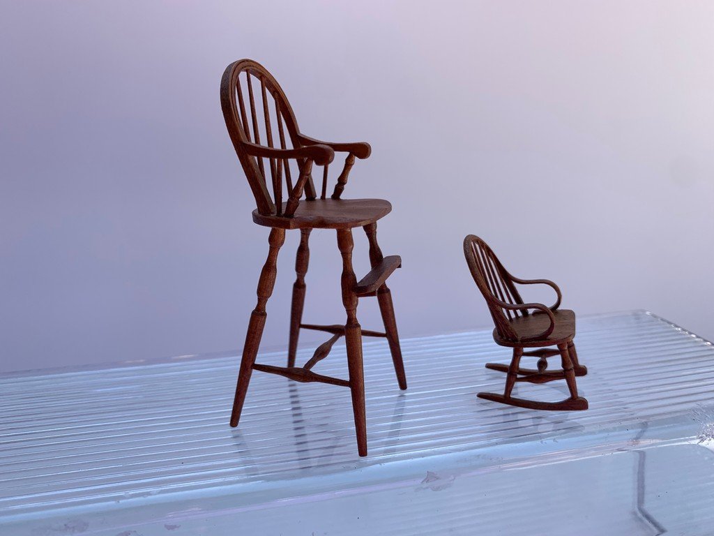 William Clinger Windsor High Chair & 1/2" Rocker: This is a two piece lot from William Clinger. There's a Windsor baby high chair with a half scale rocking chair. The rocking chair can also be used for a child or a stuffed animal. It's well made, art