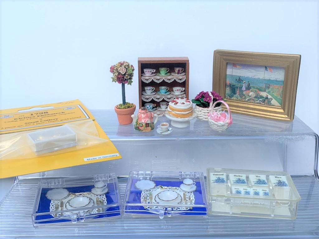 12+ Piece Tea Room Lot w/ Valerie Casson Teapot: This is a Tea Room lot that includes a shelf with hand painted tea cups and saucers. There's a Mini Mundus box of gold plated cutlery (no longer available) as well as 2 Chrysonbohn place settings, a t