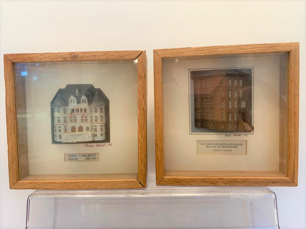 Rockefeller & Hubert Houses Vignette in Frames: This is a lot of 2 Bruce Hunter framed vignette of the Rockefeller and Hubert houses. The 3D houses are framed in the glass enclosed frame.