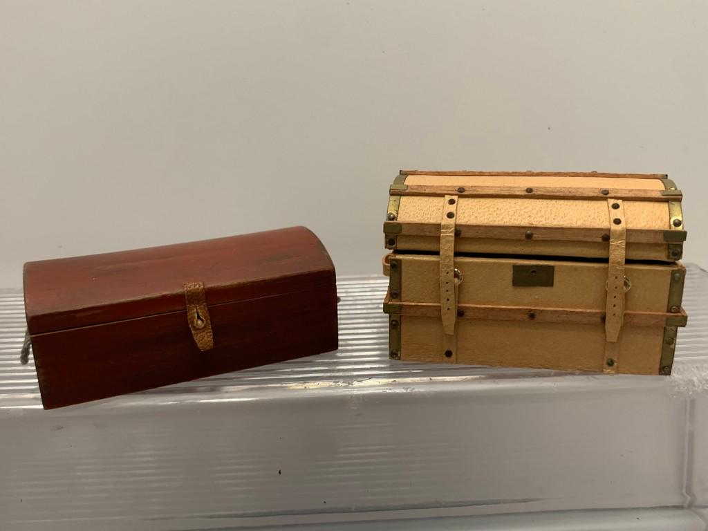 2 Piece Lot of Al Chandronnait Trunks, 1980: From the personal estate and collection of Al Chandronnait. The trunks are wooden and the left one is painted and aged nicely. The trunk on the right is from 1980 and is in excellent condition with le