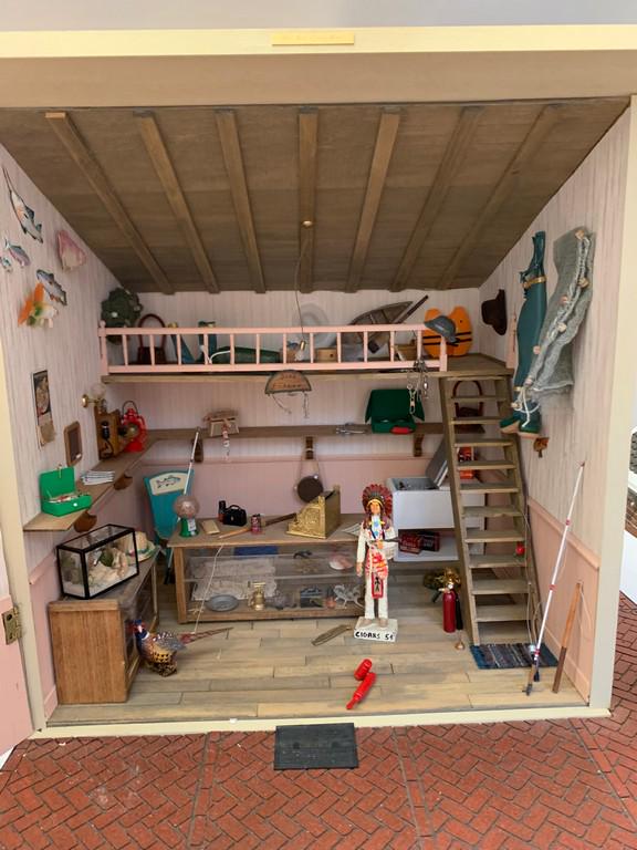Bait and Tackle Shop Decorated & Furnished: This is a wooden Bait and Tackle shop. Decorated with all the furniture and accessories shown. There's fishing poles, can of worms, boots, cooler with ice and fish, beer, soda, fish tank, counters, lo