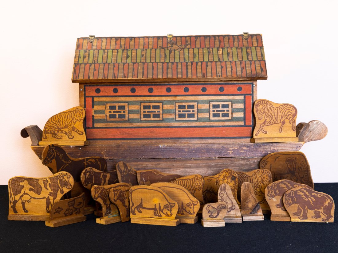 Vintage Wooden Noah's Ark with Animals: Vintage wooden Noah's Ark with wooden animals that are paper covered over wood. The animals are on wooden bases. The top of the roof lifts off to take the animals in and out of the ark. 22" W x 6" D x