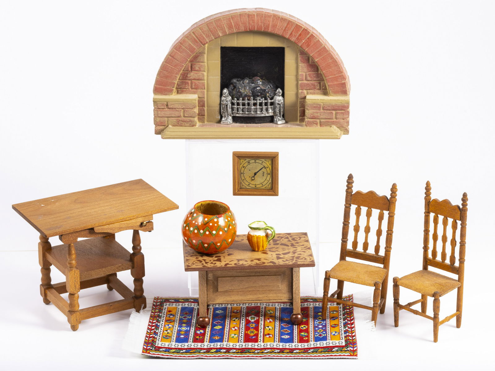 Verl Kraeger Furniture & Handmade Fireplace: Verl Kraeger handmade chairs with a table that opens to a chair. Well made and unique. The fireplace is handmade as well, made in England and is brick. The fire grate has little soldiers. The colorful