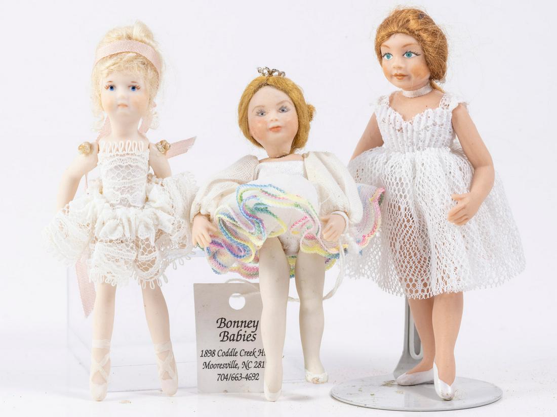 3 Little Girl Ballerinas - One From Bonney Babies: Three adorable little girl ballerinas. They are all different from different hand crafters. The dolls are porcelain and dressed in costume.