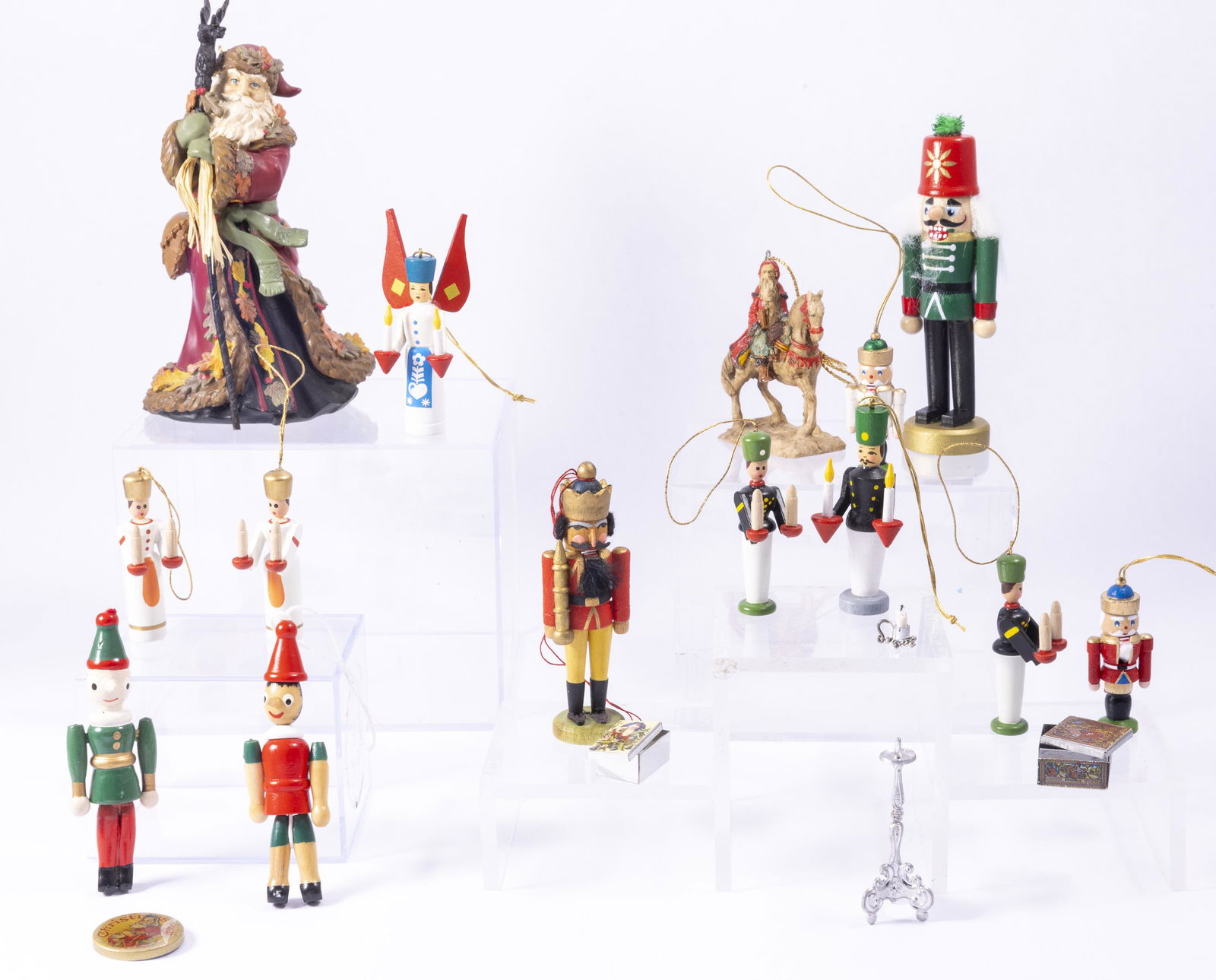 Wooden Ornaments, Large Father Christmas, Nutcrackers Various Sizes, Christmas Tins & More: We begin with our nearly 6" tall Father Christmas ornament, followed by many additional wooden puppet and nutcracker ornaments that vary in size from 2" - 2 1/4" and more. Metal candlestick -small and