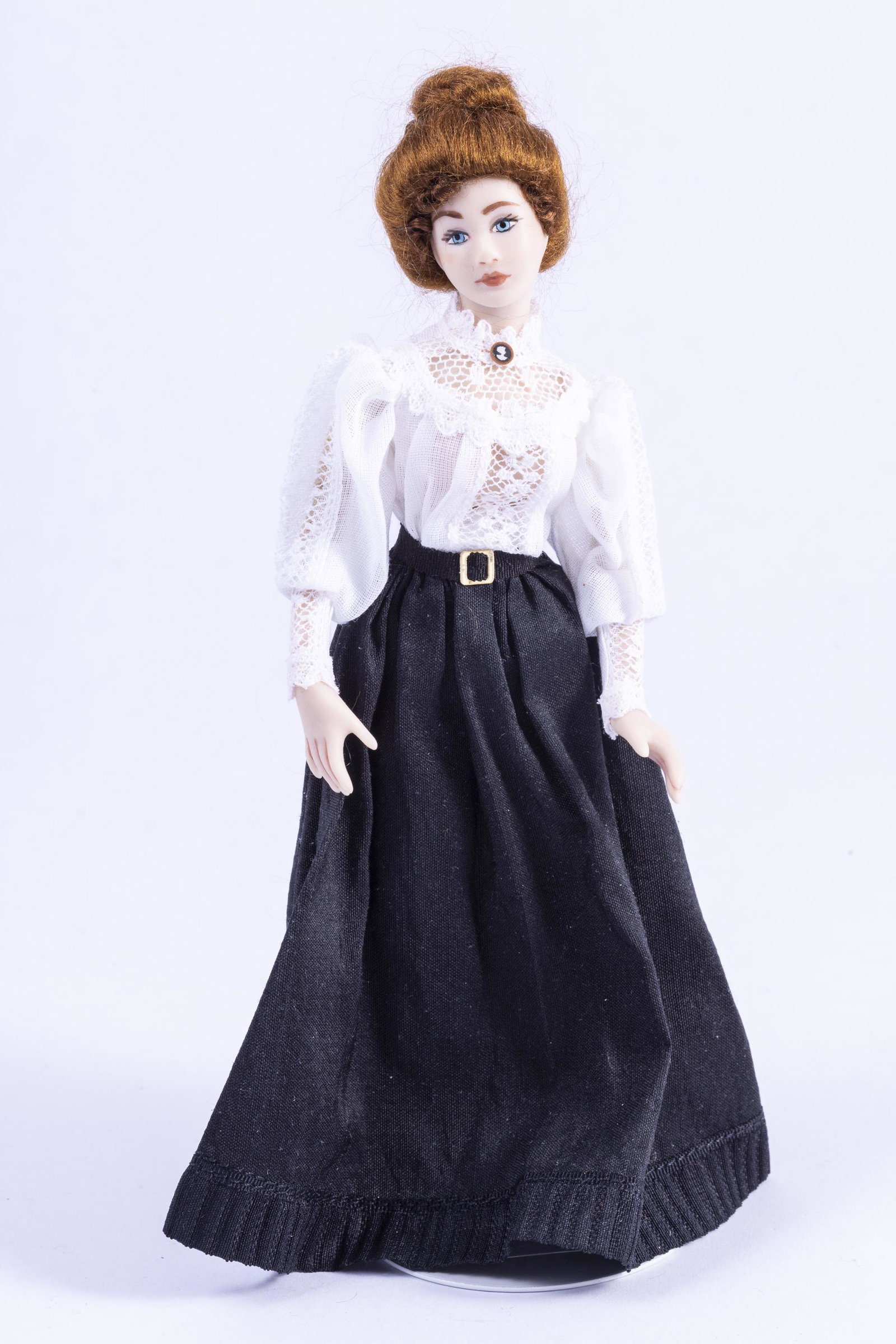 Porcelain Doll By Debra Hammond: This is a wonderful porcelain doll by artisan Debra Hammond. The doll is beautiful with an updo hairstyle and has a long black skirt, white blouse and is terrific for an old fashioned setting.