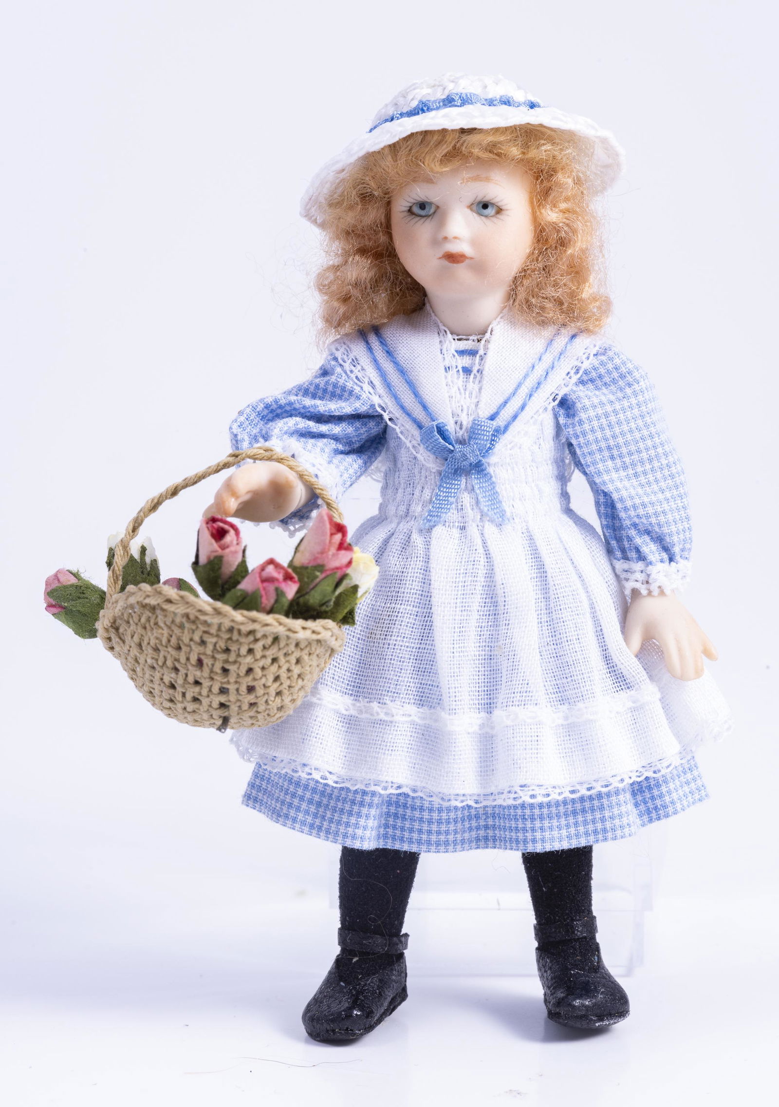 Little Girl Porcelain Doll Holding Roses in Basket (1 of 4)