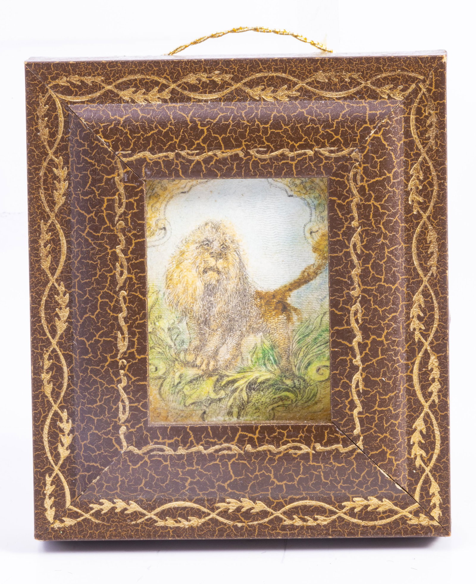 Antique Engraving From 1920 of a Lion - Hand Tinted: This is a hand tinted antique engraving of a lion. It's in a wooden frame with a painted gold colored edge in a two dimensional frame.