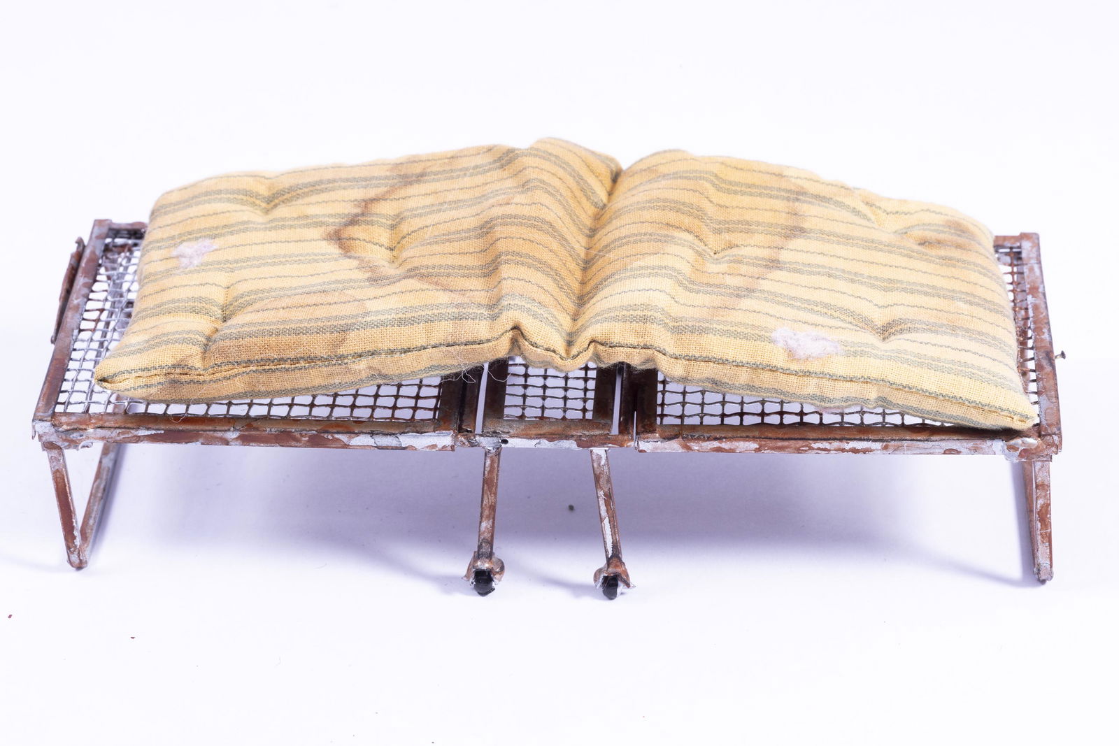 Old Mattress on Rusty Folding Cot with PER Side Table Decorated (1 of 9)