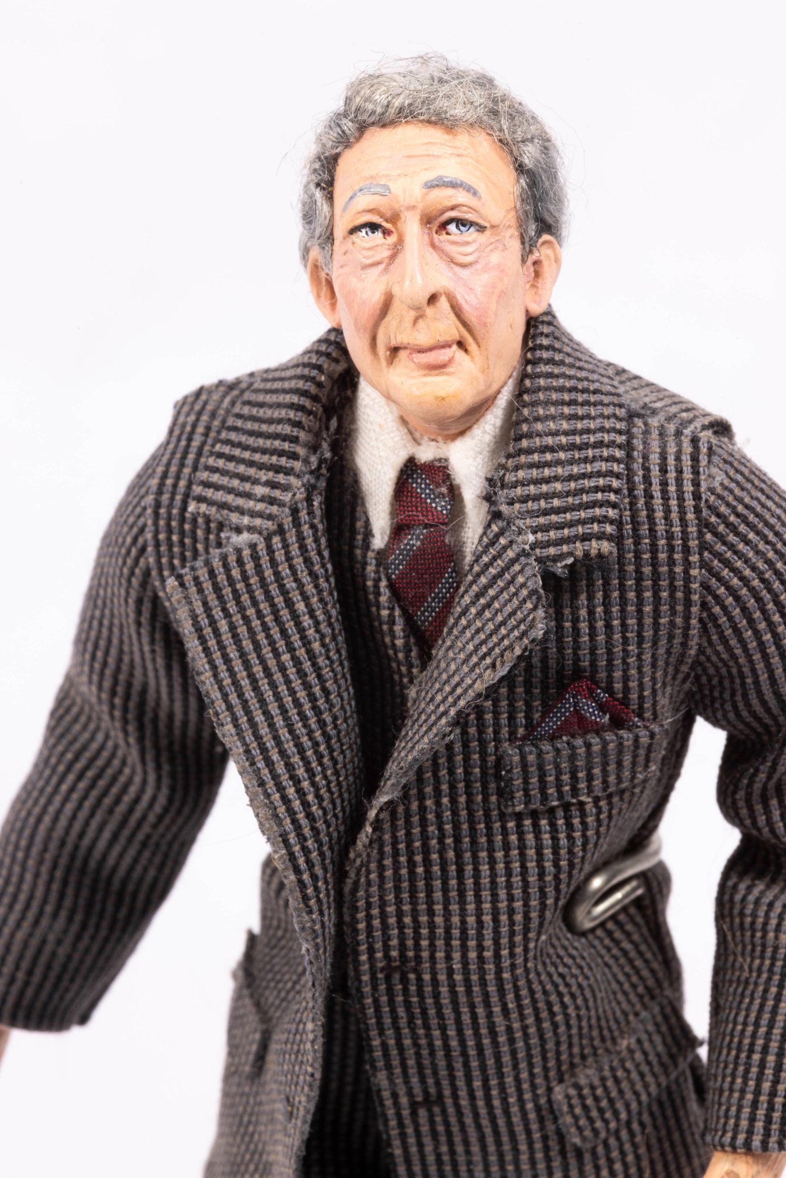 Marcia Backstrom Gentleman Older Doll: Marcia Backstrom gentleman doll. The doll is an older gentleman wearing a pin striped suit. The owner of this doll was a collector and in magazines as she was one of the first people to buy her dolls 