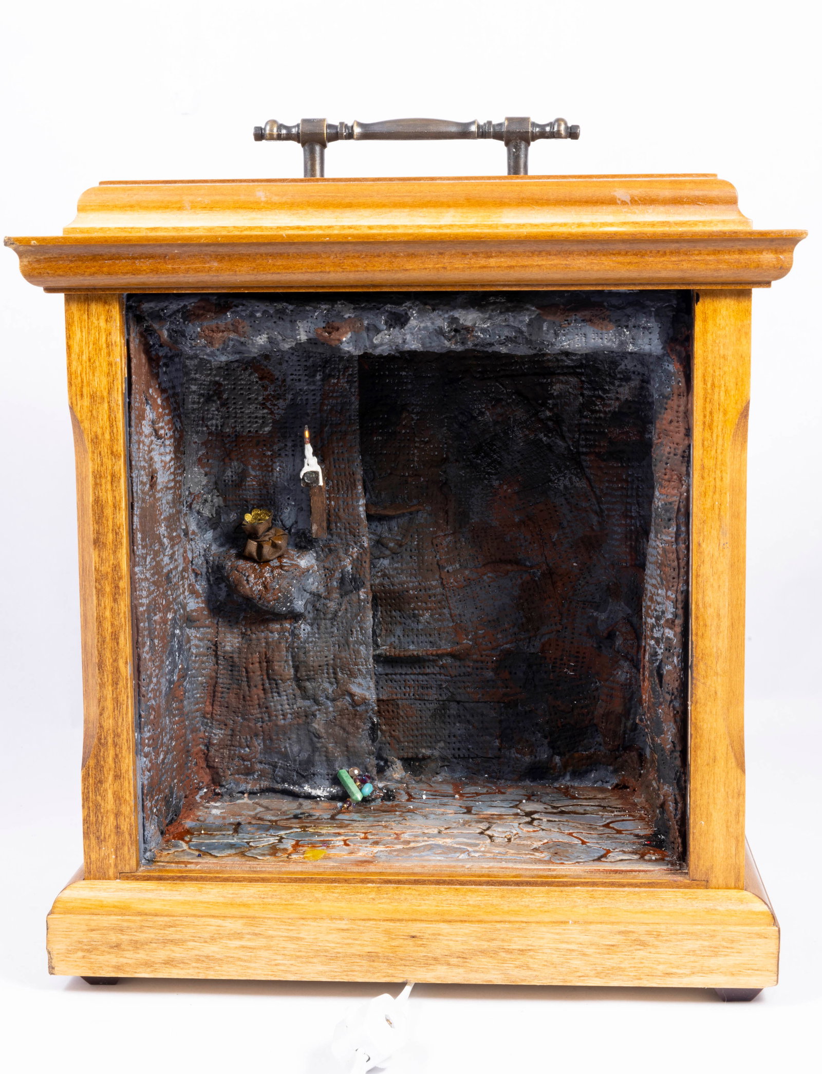 Aged Dungeon Roombox with Working Candle: Handmade by Tim Kraft, this is an aged interior roombox of what looks like a dungeon. There's a bag of coins, a working 12 volt candle, and some built in shelving. It's in a wooden roombox with metal 