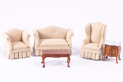 5 Pc Living Room set with two chairs, a sofa, coffee table and a side table. The wood table has a