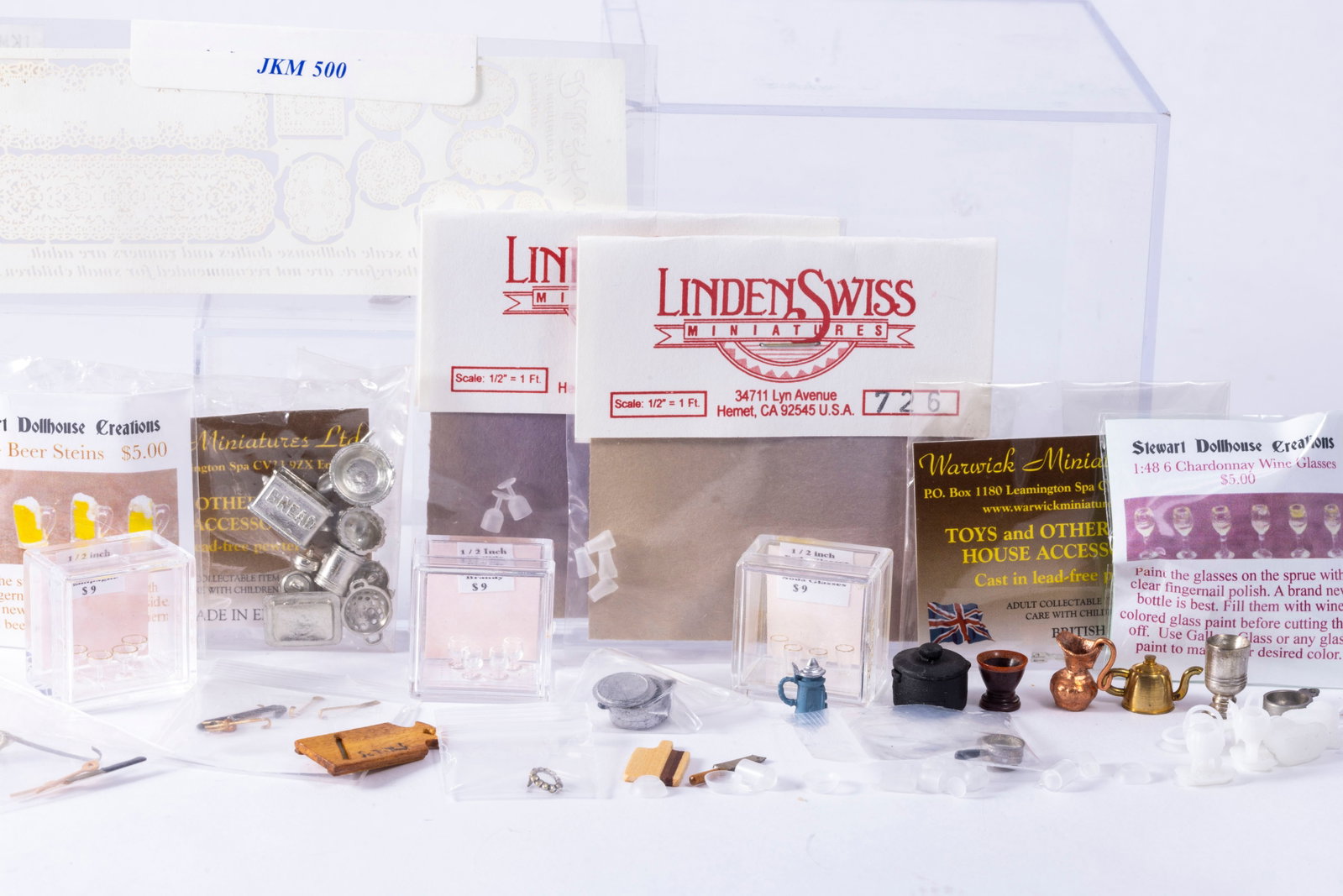 1:48 & 1:24 Scale Accessories Kitchen Items Lot: Several half scale and quarter scale items including a copper pitcher, wooden cutting board with blade, beer steins, cups, wine glasses, pot, doilies, cutlery and more. Some hand crafted as well.