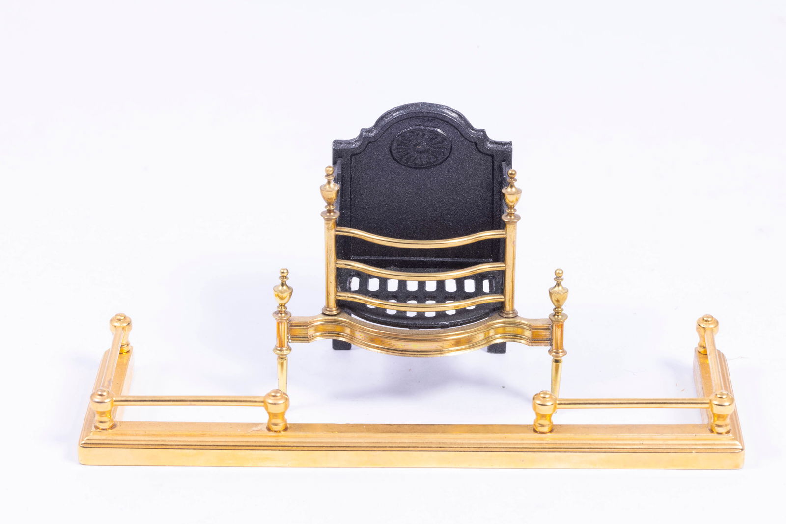 Alec Rothwell Fireplace Fender & Firegrate: Well made brass fireplace grate in brass and metal. There's an Alec Rothwell fireplace brass fender as well.