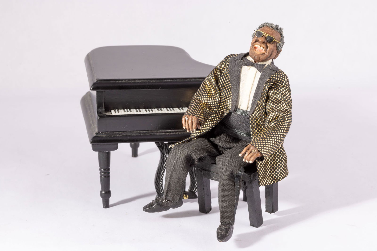 Ray Charles Doll on Black Grand Piano (1 of 4)
