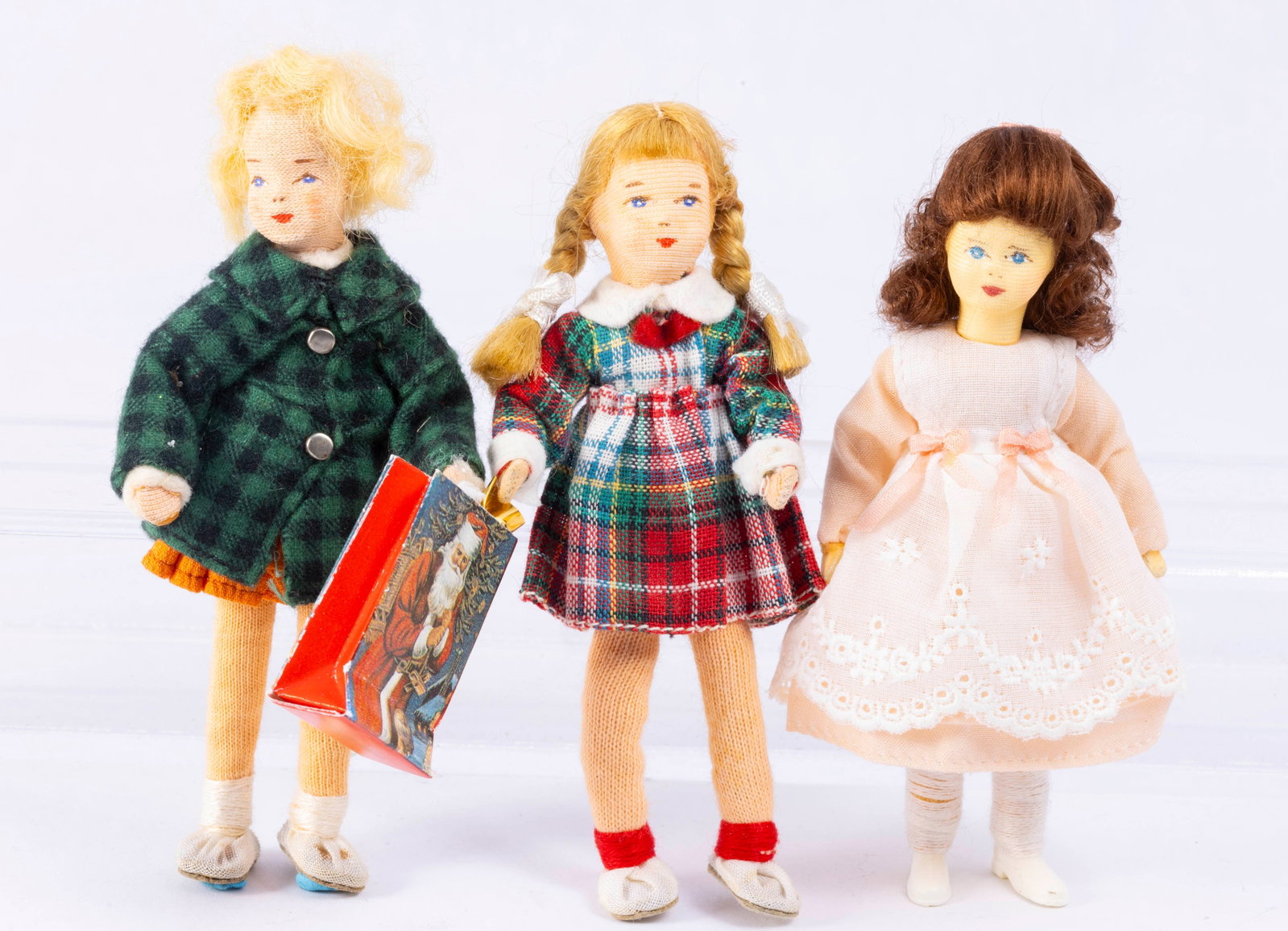 Set of 3 Erna Meyer Dolls - All Girls: Three Erna Meyer dolls. All different girls. One is blonde in a skirt and jacket, one has braided pig tails with a checkered dress and one is a brunette in a dress.