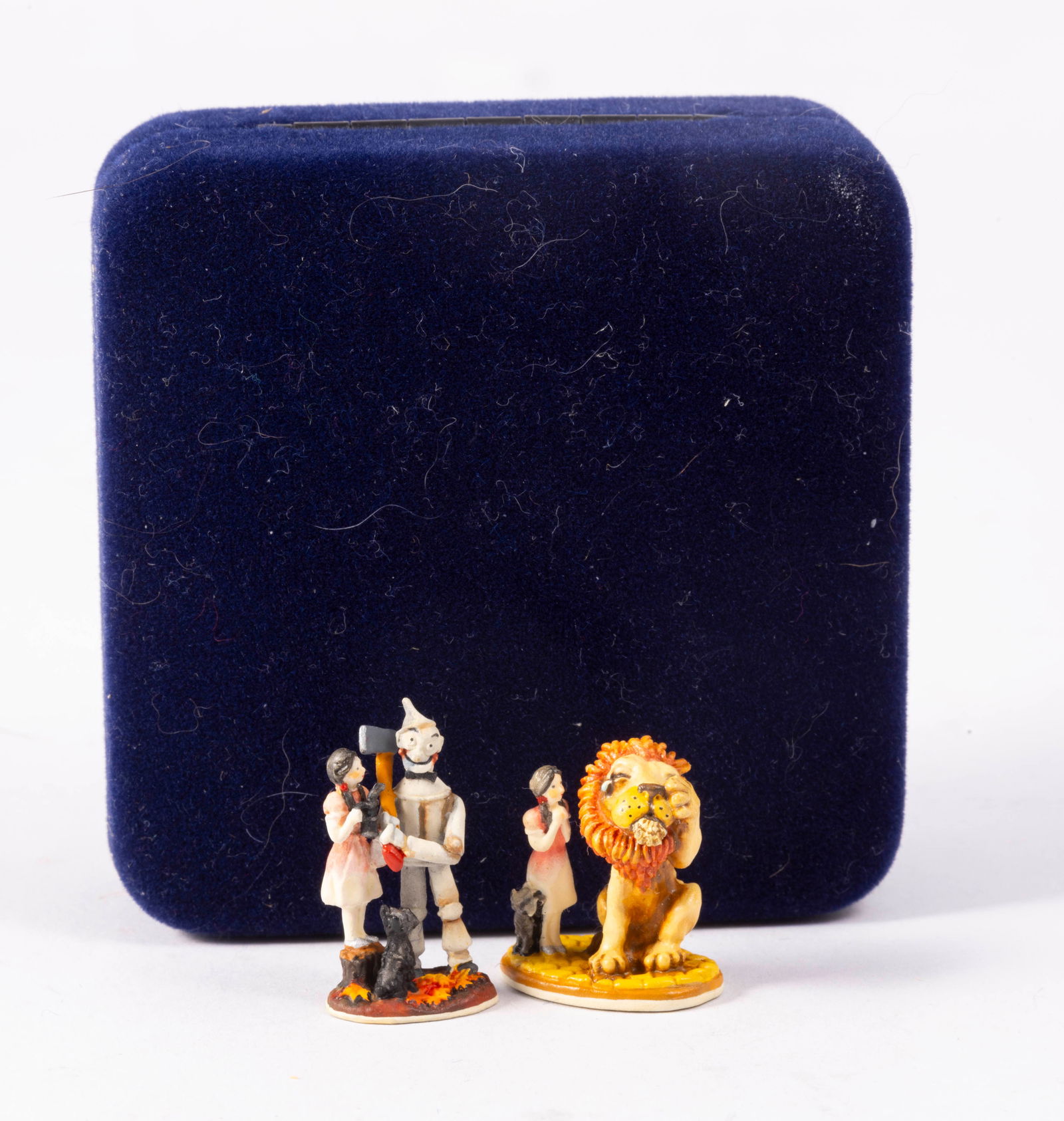 Goebel Olszewski - Dorothy with Tin Man & Dorothy with Cowardly Lion: Two figurines, both with Dorothy and Toto. One is Dorothy and the Cowardly Lion, the other is Dorothy and the Tin Man. Wizard of Oz.