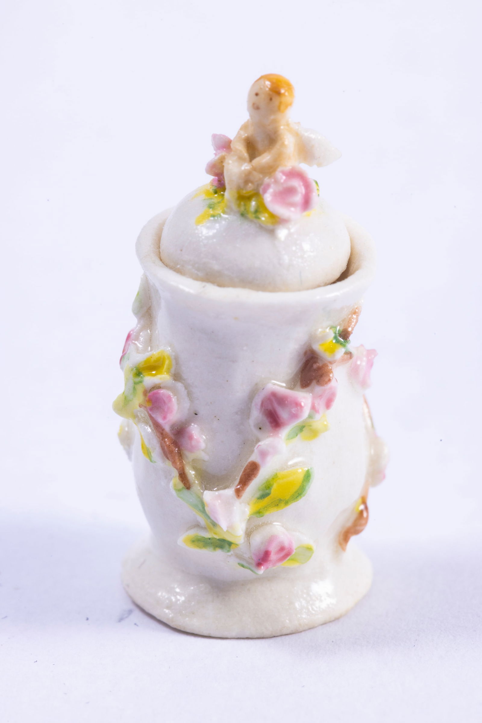 Veronique Cornish Lidded Jar With Cherub: Veronique Cornish porcelain lidded jar with cherubs. The lid is removable, and decrorated beautifully.