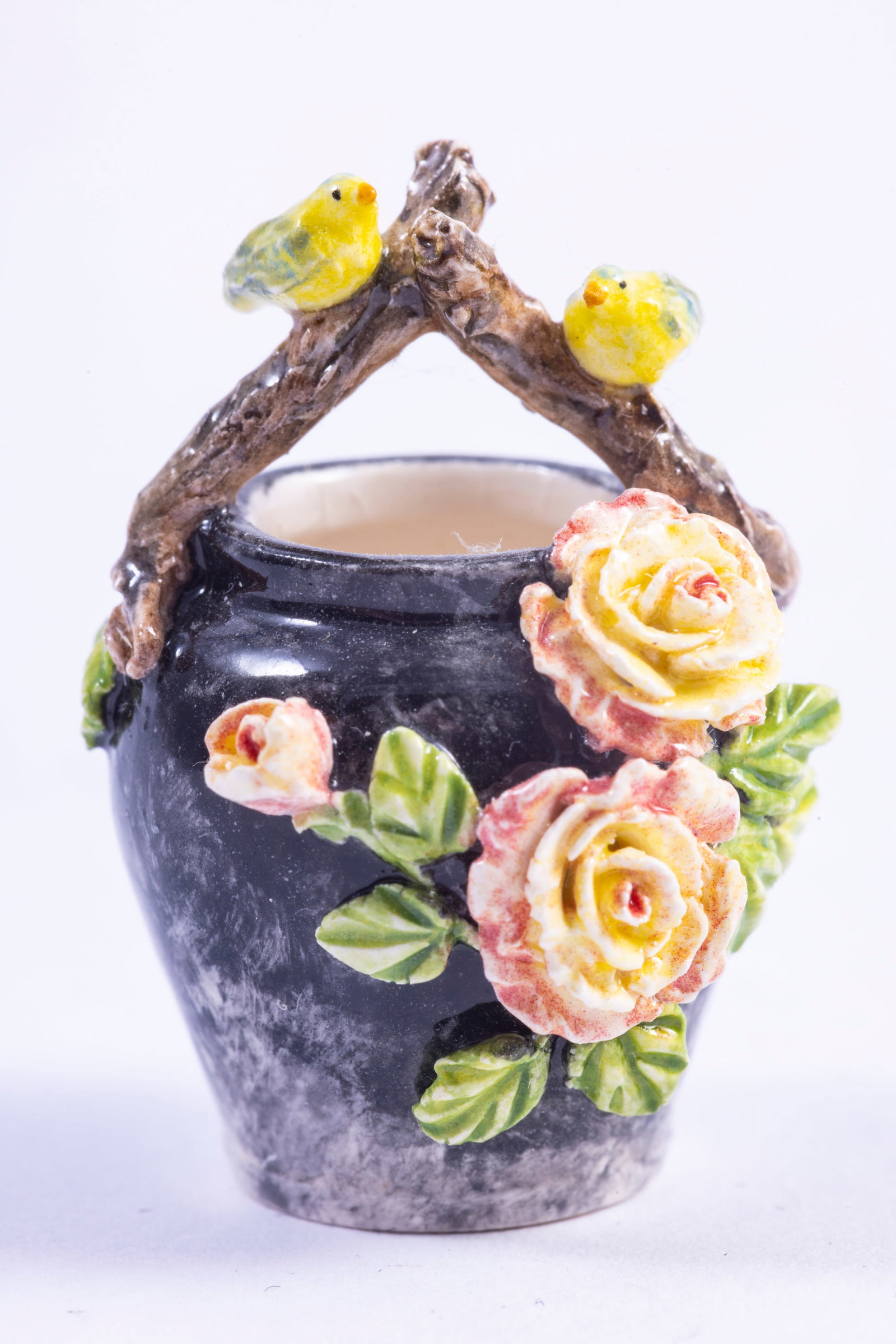 Jack Cashmere Vase with Flowers: This is a porcelain vase by Jack Cashmere. Decorated with beautiful flowers on the outside of the vase.