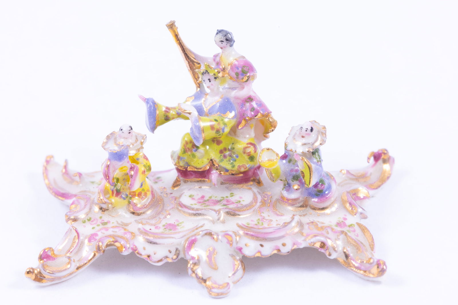 Tricia Street Inkstand Figurine: This is a beautiful hand made porcelain Tricia Street piece. It's an Inkwell. There's a lady in the middle with another next to her with two people on either side. Please note: there's a small chip on