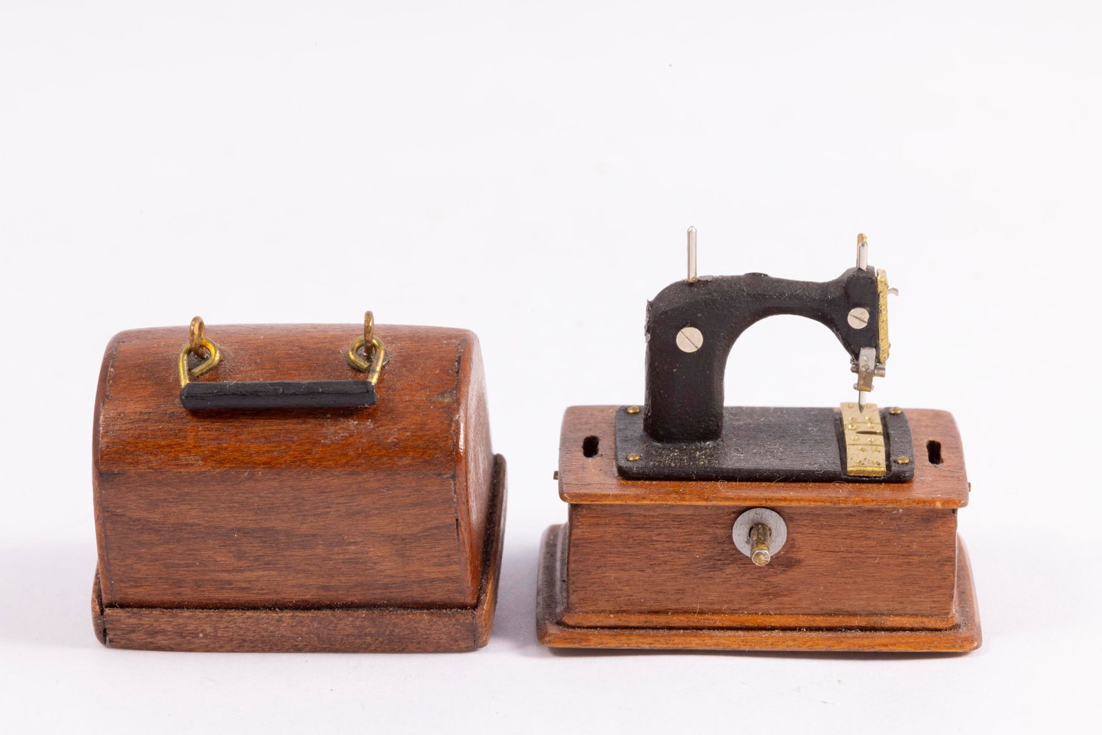 Nantasy Fantasy Handmade Sewing Machine: Handmade wooden sewing machine by Nantasy Fantasy. The top is removable. The piece is well made and signed. Approximately measures: 1 5/8" 1 3/16" x 1 3/4