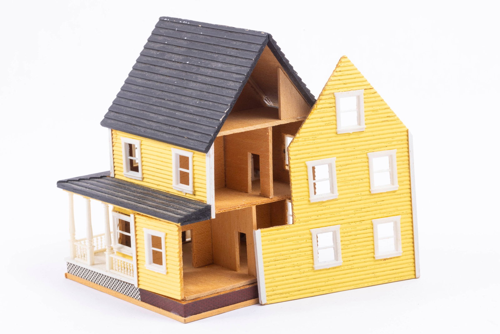 1:144 Scale Yellow Farmhouse Breakaway - Millie August: 1:144 Scale yellow breakaway dollhouse by Millie August. Yellow farmhouse with back opening. Inside is unfinished, made of wood.