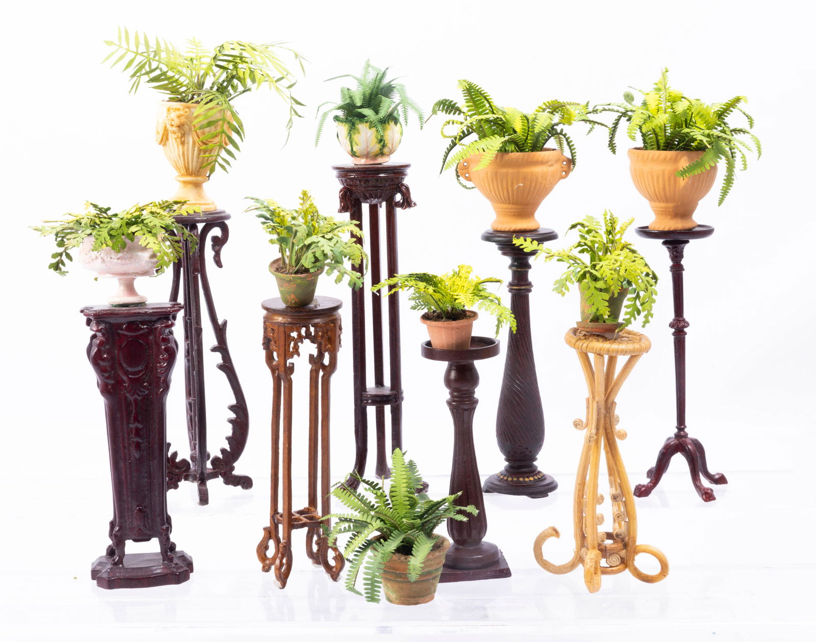 Big Assortment of Wooden Plant Stands with Ferns - Bespaq: Big assortment of wooden plant stands and handmade ferns in pots. Several mahogany Bespaq plant stands, one bamboo plant stand, and more.