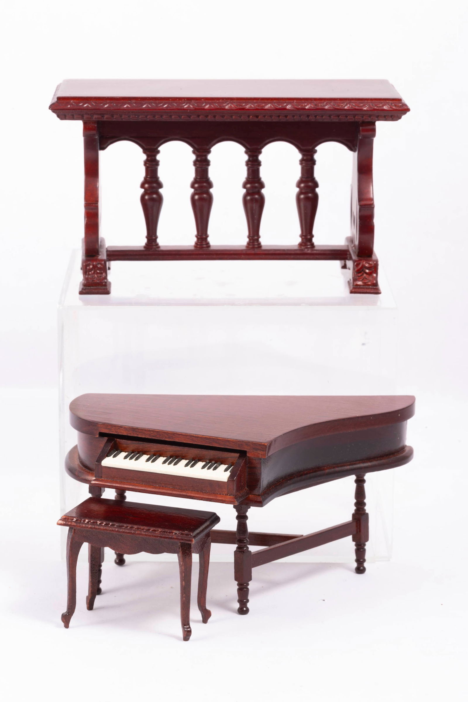 Mahogany Piano with Bench & Table: Mahogany piano with bench and table. This is a vintage mahogany piano and bench. There's a table in mahogany as well.