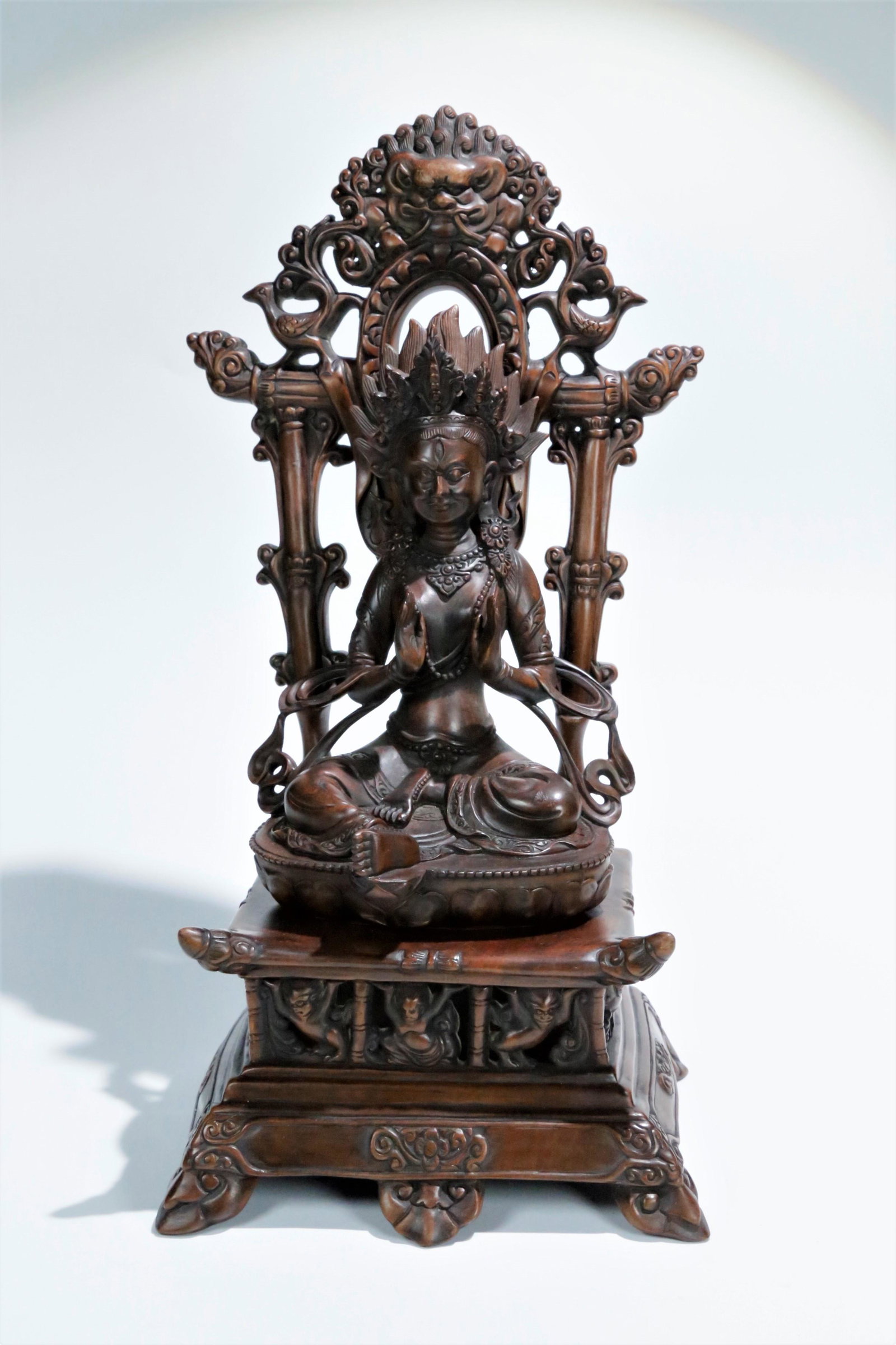 A boxwood figure of the buddha: A 18th century boxwood figure of the buddha Nepal Size:15.5cmx11.5cmx30cm