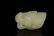A fine white jade 'dragon' ring