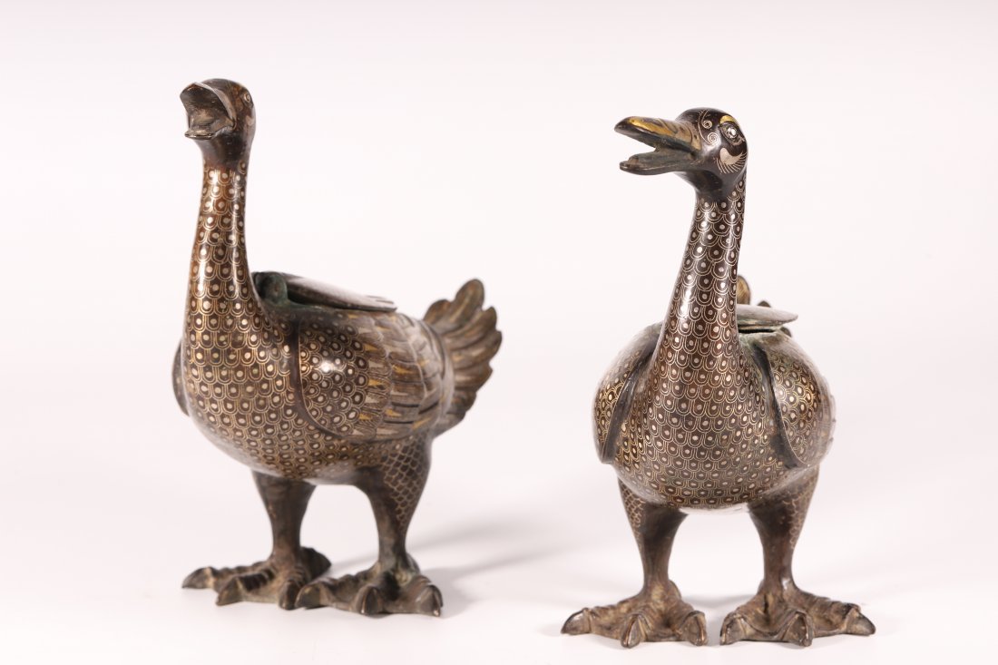 A Fine and Exceptional Pair of Copper inlaying with Gol: A Fine and Exceptional Pair of Copper inlaying with Gold Silver DucksChinese Han Dynasty Size: 20cmX23cm