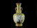 A yellow-ground famille-rose 'flower and bird' vase