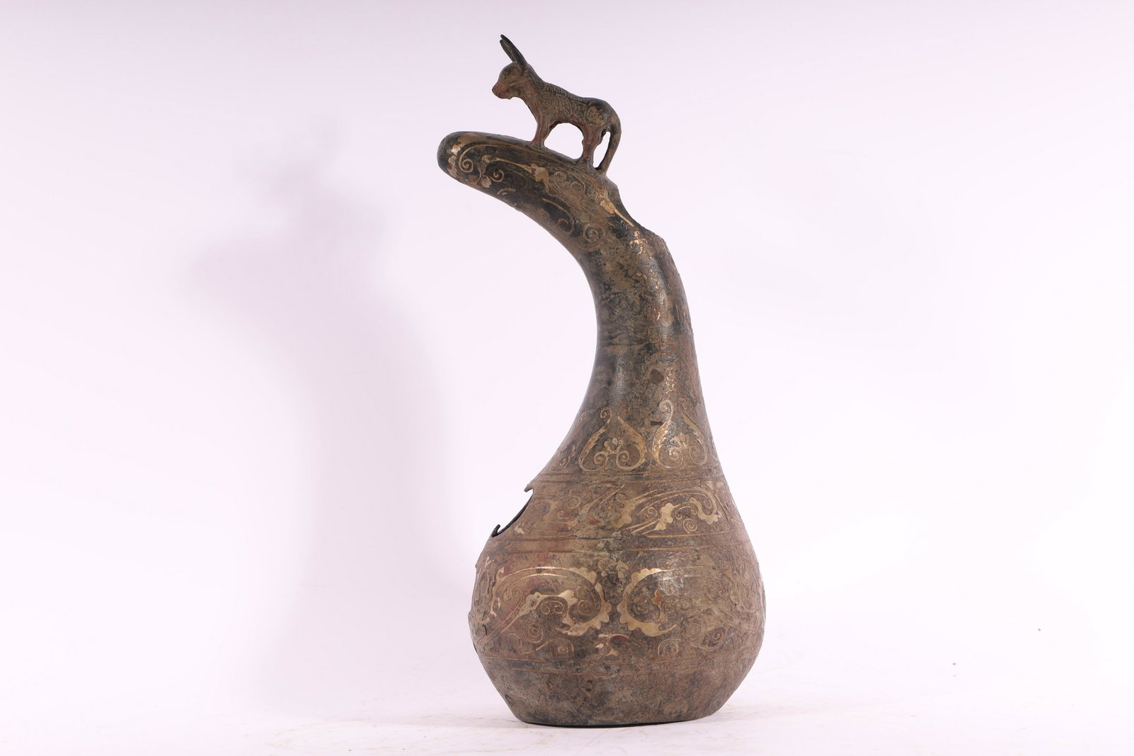 A Fine Gold and Silver Inlaid-Bronze Head of Goat Vase: A Fine Bronze Gold and Silver Inlaid-Bronze Head of Goat Vase Chinese Han Dynasty Size:14.5cmX33.5cm