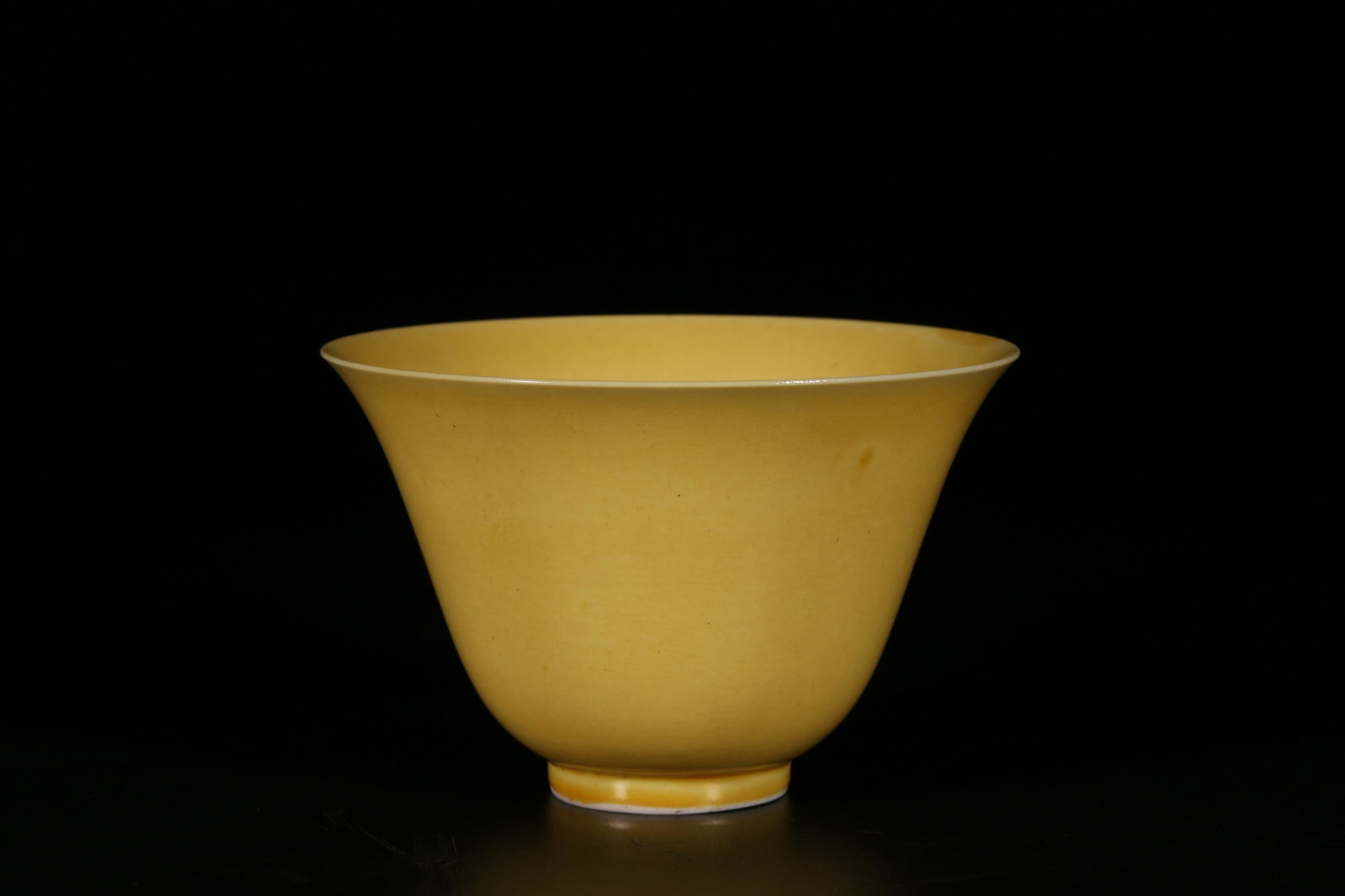A Yellow glazed bell bowl: A Yellow glazed bell bowlChinese Ming Dynasty Mark of JiaJingSizeï¼š7.4cmX11.3cm