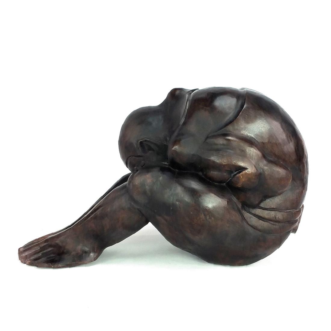 LARGE MAHOGANY WEEPING BUDDHA: You are bidding on a Vintage Javanese Weeping Buddha. Hand Carved from a single block of Mahogany wood, the Sculpture is depicted in an anguished fetal position with stretched legs. This sculpture sym