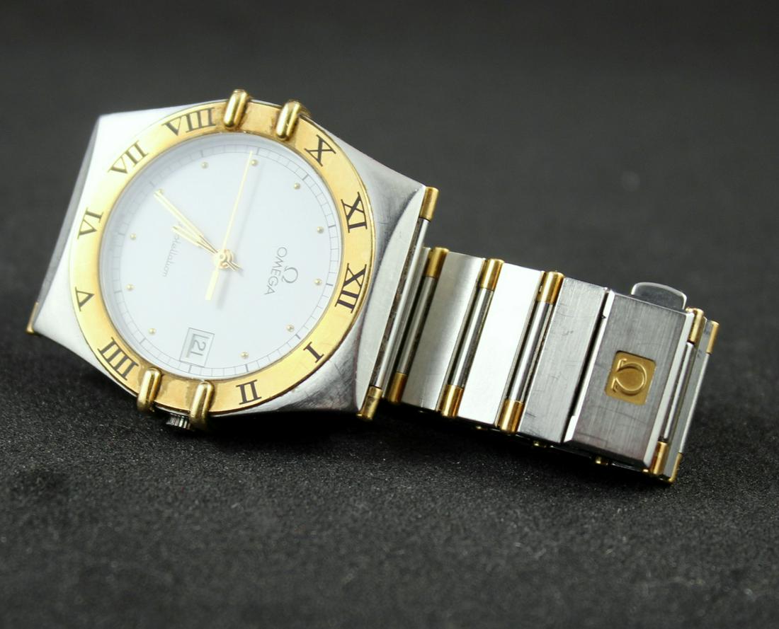 Omega Constellation 14k and Stainless Mens Watch: Omega Constellation Mens Mid-Size Watch and Band. 14k and Stainless,Sweep Second Hand and Date. Good Condition Running- Marked