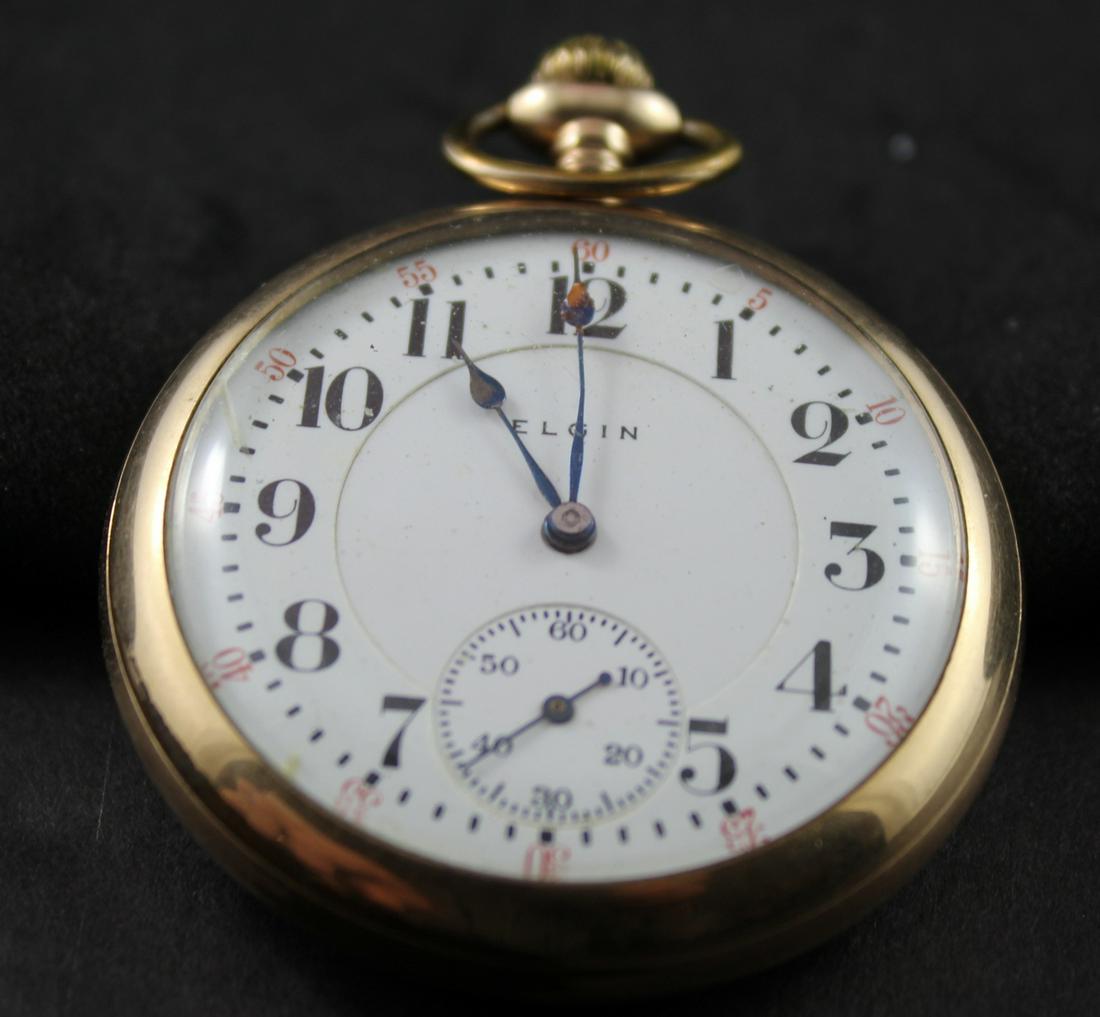 Antique Elgin Pocket Watch: Made For R.B.Raymond. 18 Size Porcelain Dial, Movement # 13,506,384 - Open Face 17 Jewels, Stem Wind + Set - Gilt Fahys Montauk Case- Running -Engraved Train On Back Cover