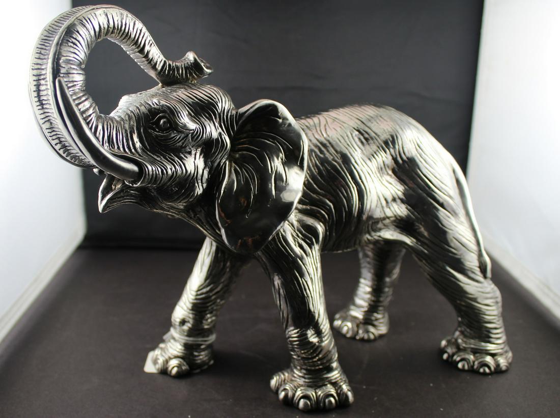 Sterling Overlay Elephant Figure: Silver Sheet Overlay Decorated Elephant Sculpture. Size 13"Long x 9"ht. Marked 925. Fine Condition.