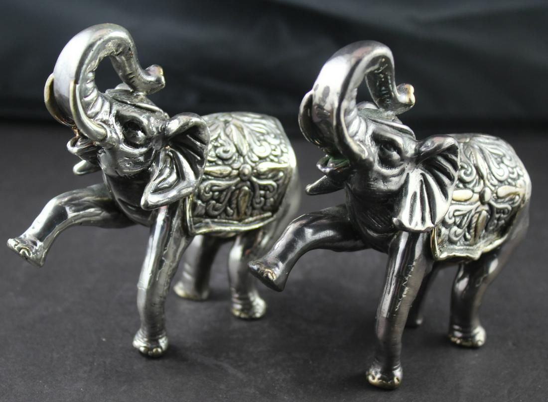 Pr.Sterling Overlay Elephant Figures: Pr.Silver Sheet Overlay Baby Elephant Figures. Marked 4"ht. x 4"long. Good Condition.