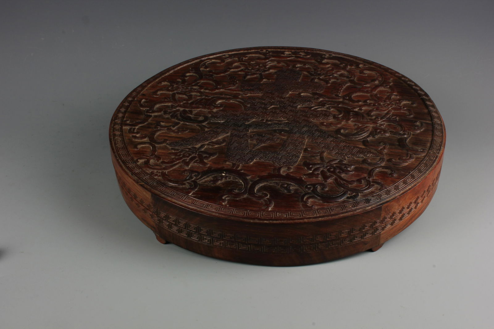 A Huanghuali "Chun" Incised Circular Case, Qing Dynasty (1 of 9)