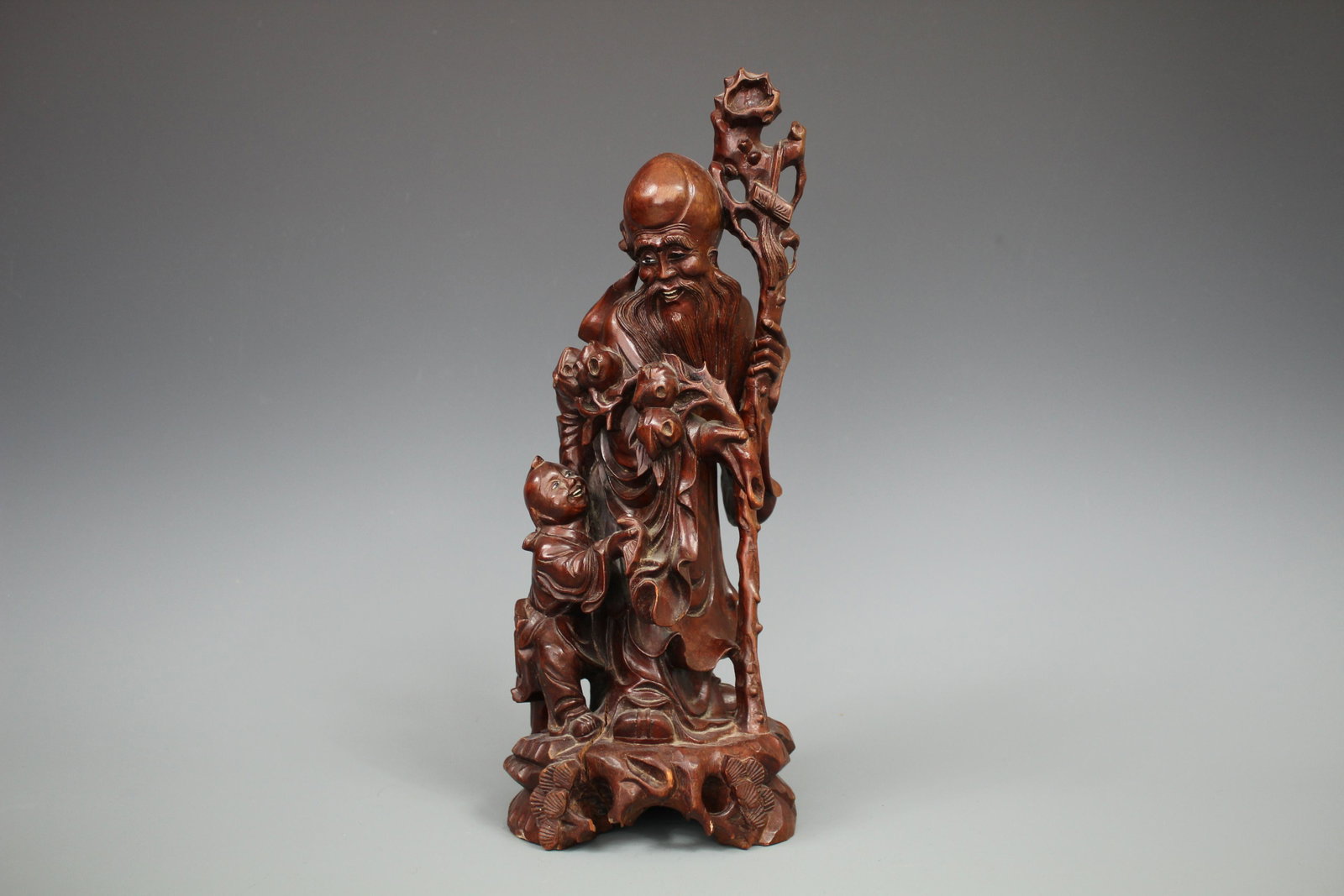 A Hongmu Carving Figure of A Senior and A Child: A Hongmu Carving Figure of A Senior and A Child